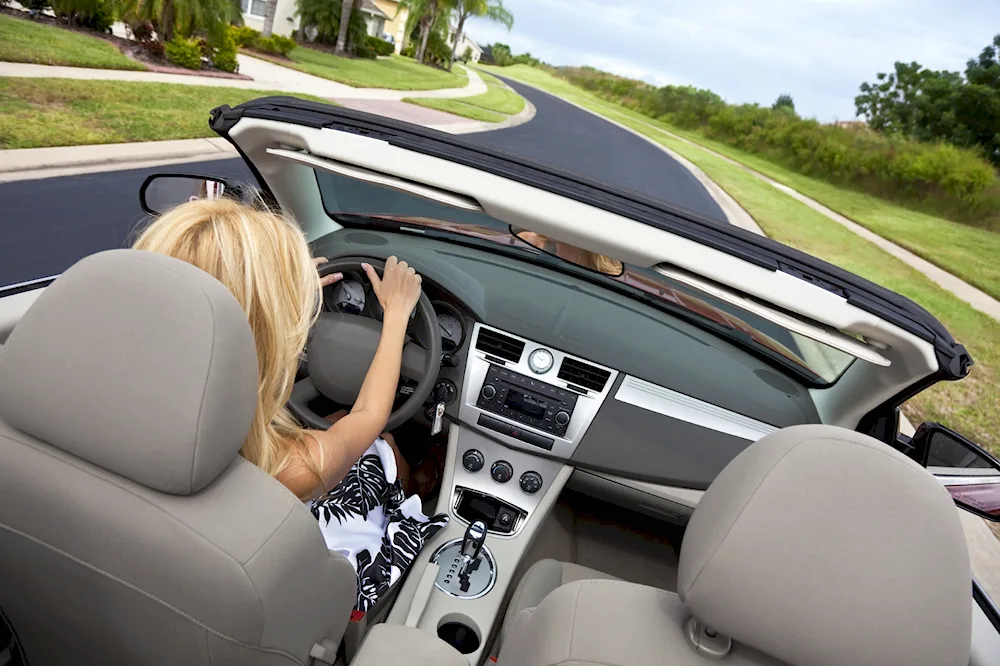 Woman in convertible