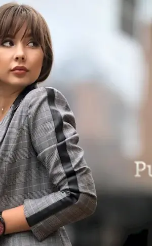 Woman in jacket sideways