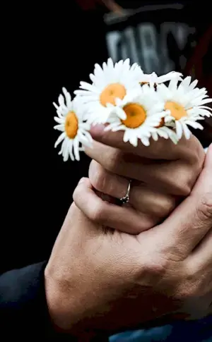 Woman's hand with flowers