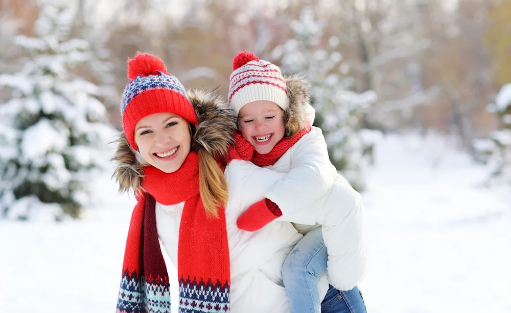 Child with dog in winter