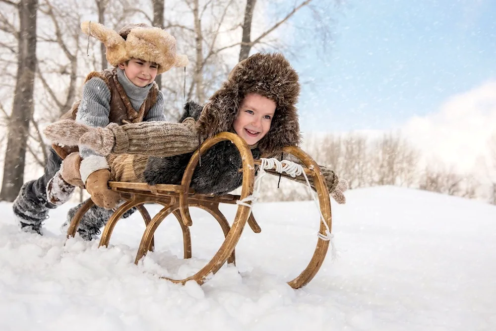 Children on sleds