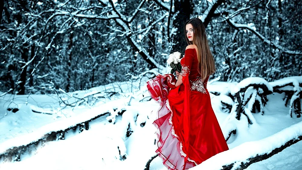 Girl in winter woods