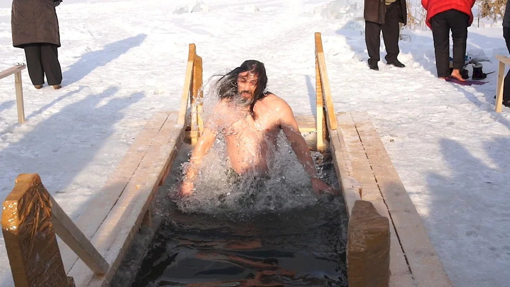 Winter bathing in an ice-hole