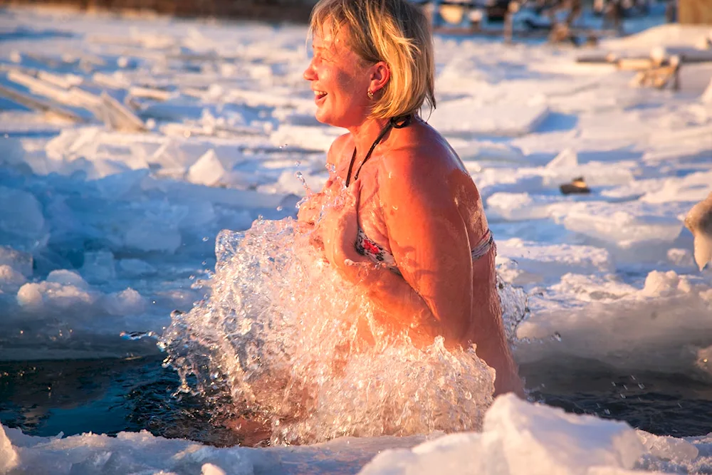 Winter bathing in the ice-hole