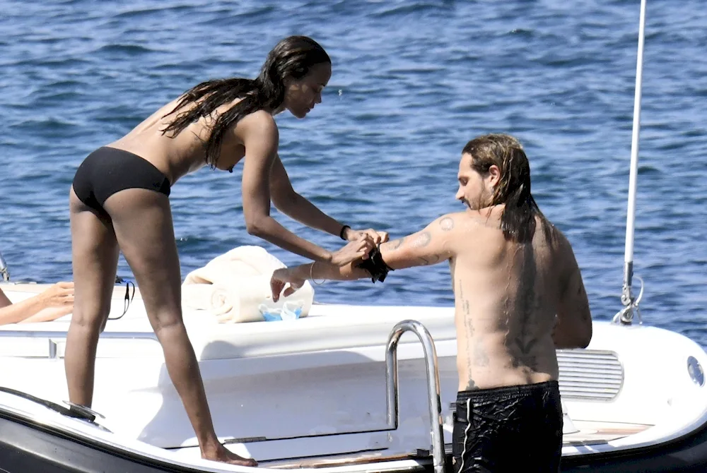 Zoe Saldana on a topless yacht